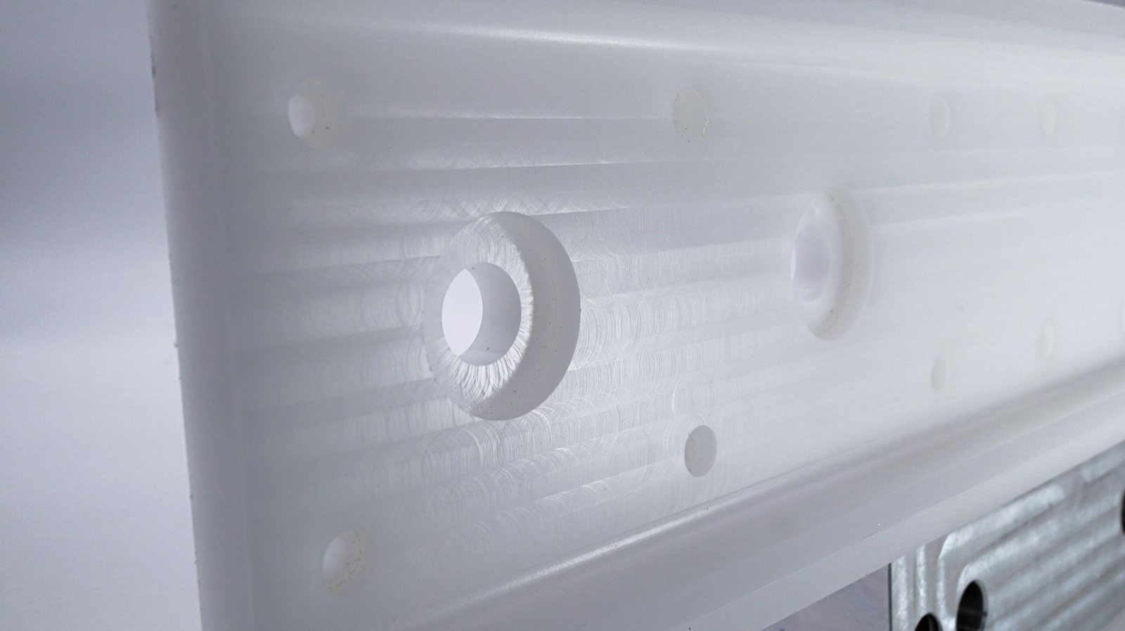 Machined Delrin guide rail